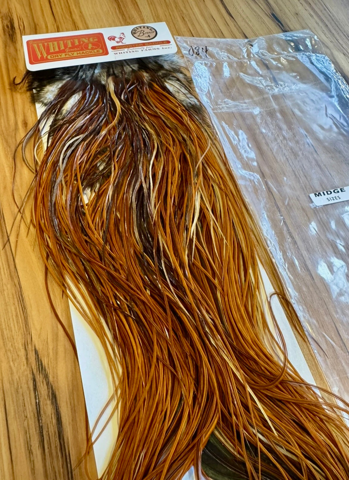 Whiting Farms BRONZE MIDGE Saddle Hackle:  BROWN 084
