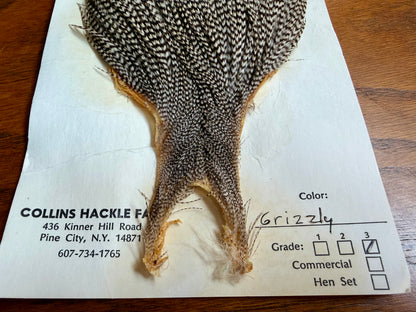 Collin’s Hackle Farm Grade 3 Grizzly Cape 694-SH-E-L